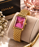OMAX Damen Armbanduhr Goldfarben Pinkes Zifferblatt Neu in Originalverpackung