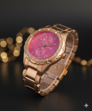 GUESS U0442L5 Damenuhr Roségold mit Pinkem Zifferblatt & Kristallbesatz